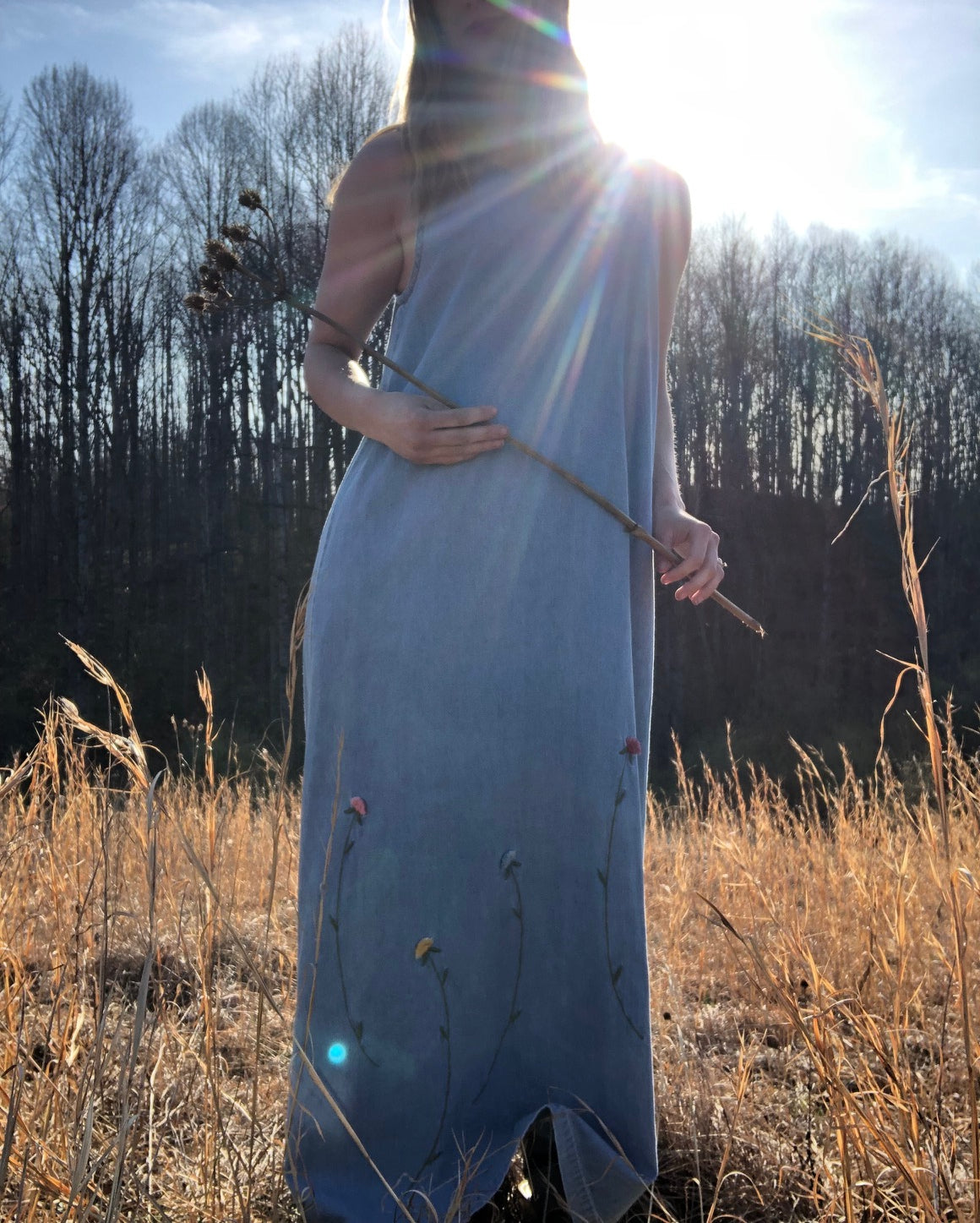 model wearing vintage denim maxi dress