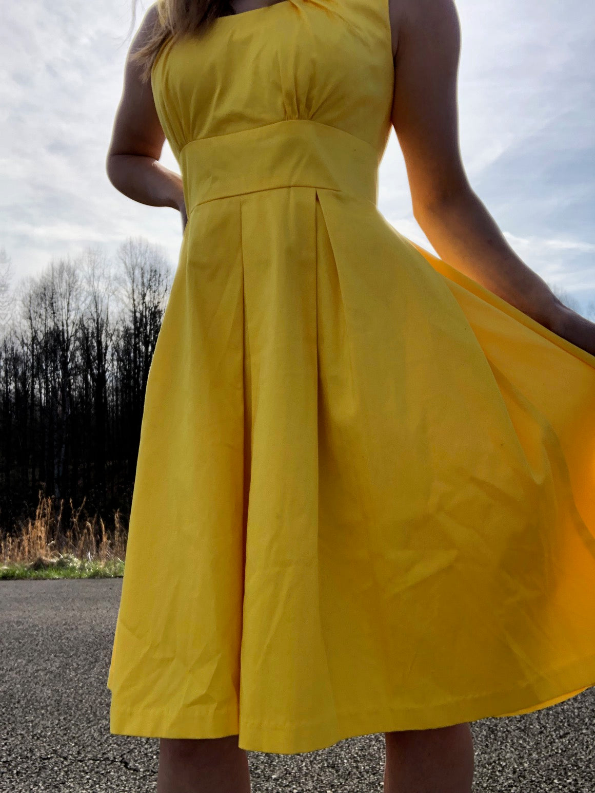 model wearing vintage new directions yellow mini dress